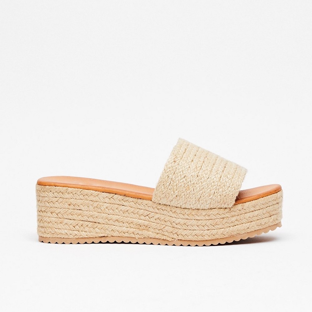 “You’re a Natural Woven Wedge Sandal” Nasty Gal